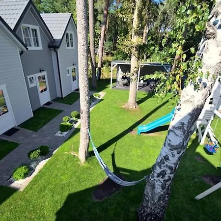 Prázdninový dům Comfortable Homes With A Beautiful Garden Pobierowo